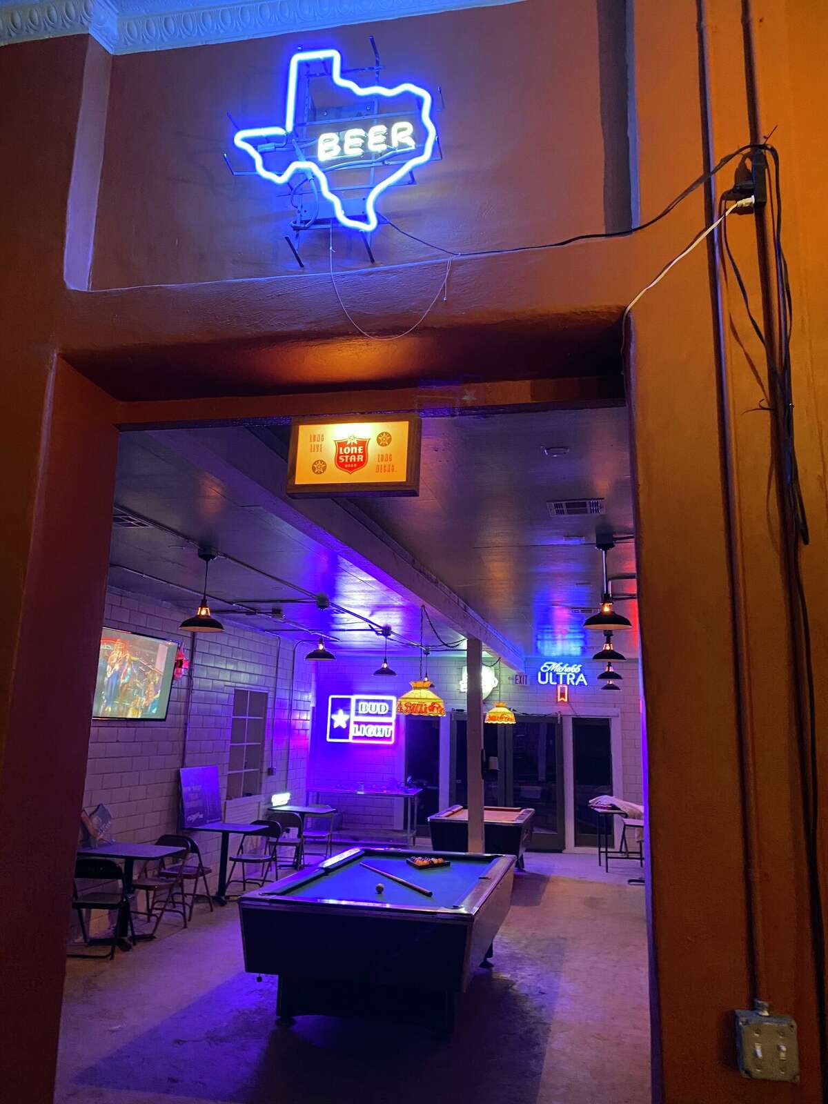 The owners of the bar sourced vintage decor from estate sales and online sellers.