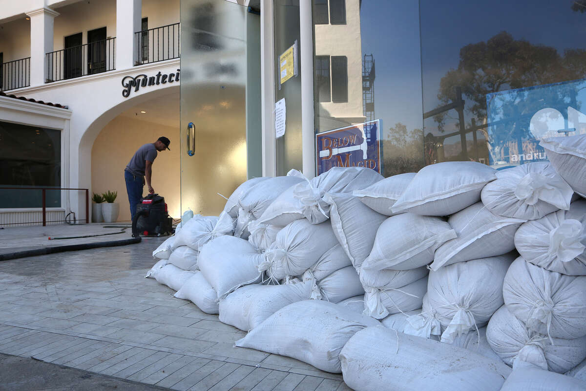 In this 2018 file photo, sandbags line part of the Montecito Inn, which was damaged by the 2018 mudslide. On Jan. 9, 2023, the fifth anniversary of the slides, the town was evacuated.