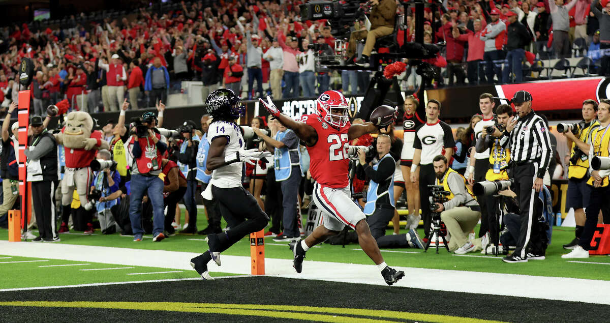 Branson Robinson #22 of the Georgia Bulldogs reacts as he scores a touchdown in the fourth quarter against the TCU Horned Frogs in the College Football Playoff National Championship game at SoFi Stadium on January 09, 2023 in Inglewood, California. (Photo by Sean M. Haffey/Getty Images)