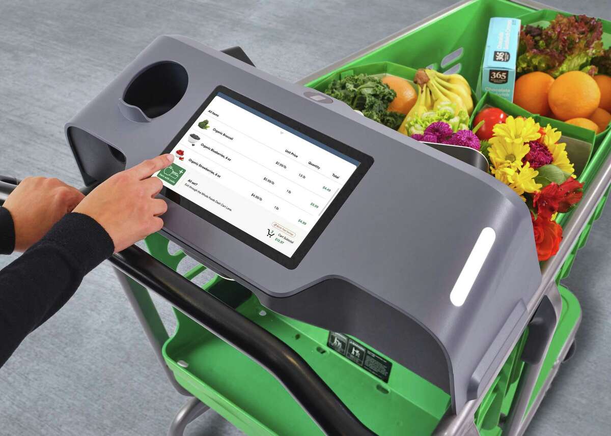 The Dash Carts have screens that show a tally of items as shoppers place them in the basket.