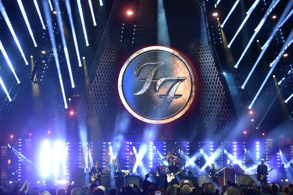 FILE - Dave Grohl and the Foo Fighters perform during the Rock & Roll Hall of Fame induction ceremony on Oct. 31, 2021, in Cleveland. Kendrick Lamar, Foo Fighters and ODESZA will headline the Bonnaroo Music and Arts Festival in June 2023 in Tennessee. The Foo Fighters are returning to touring in 2023 after the sudden death of drummer Taylor Hawkins last March. The rock band was supposed to headline Bonnaroo in 2021, but the festival was cancelled due to flooding. 