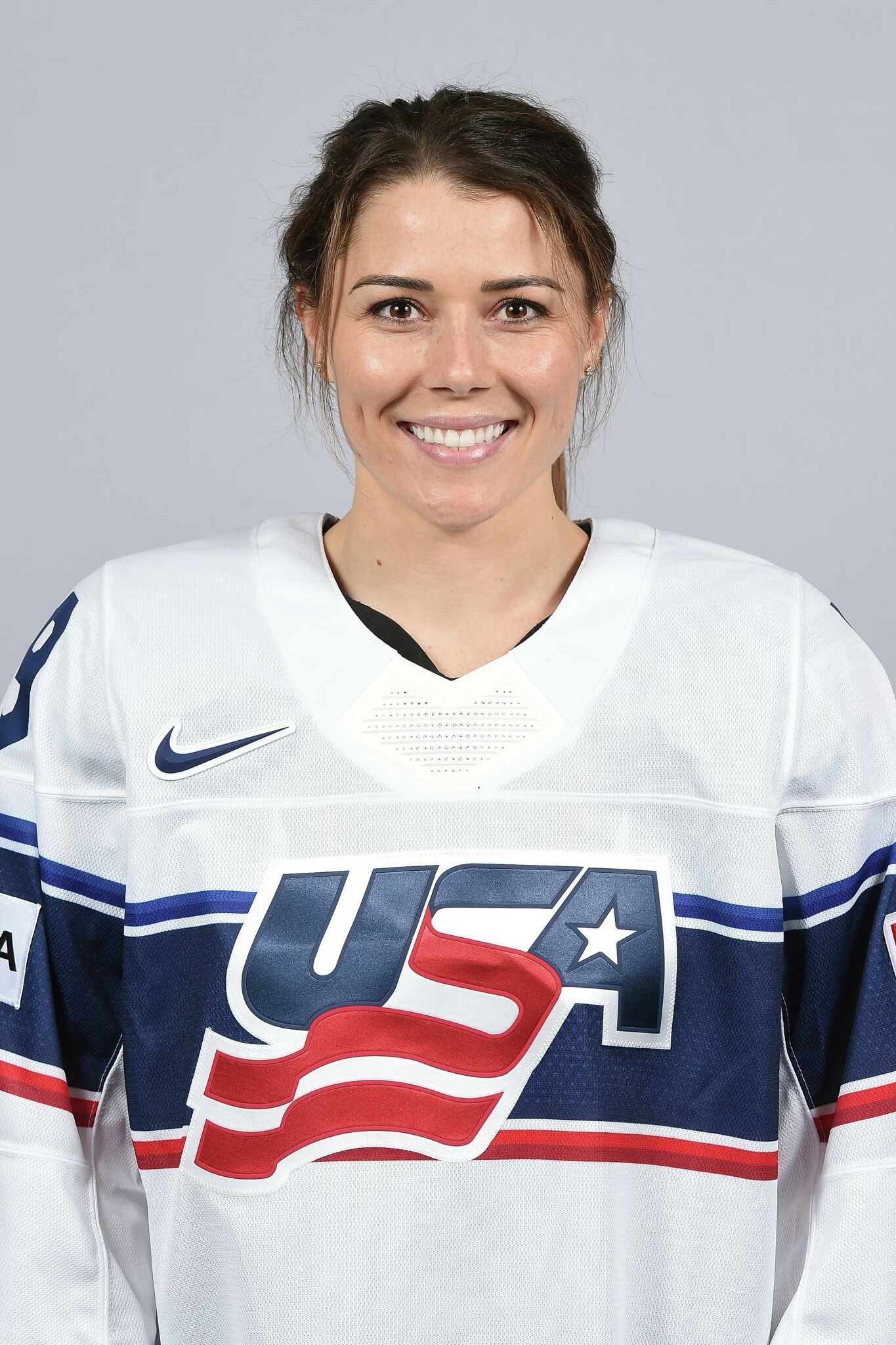 Joy Dunne, who trains with Elite Hockey School in East Alton, busy in  Sweden with US team