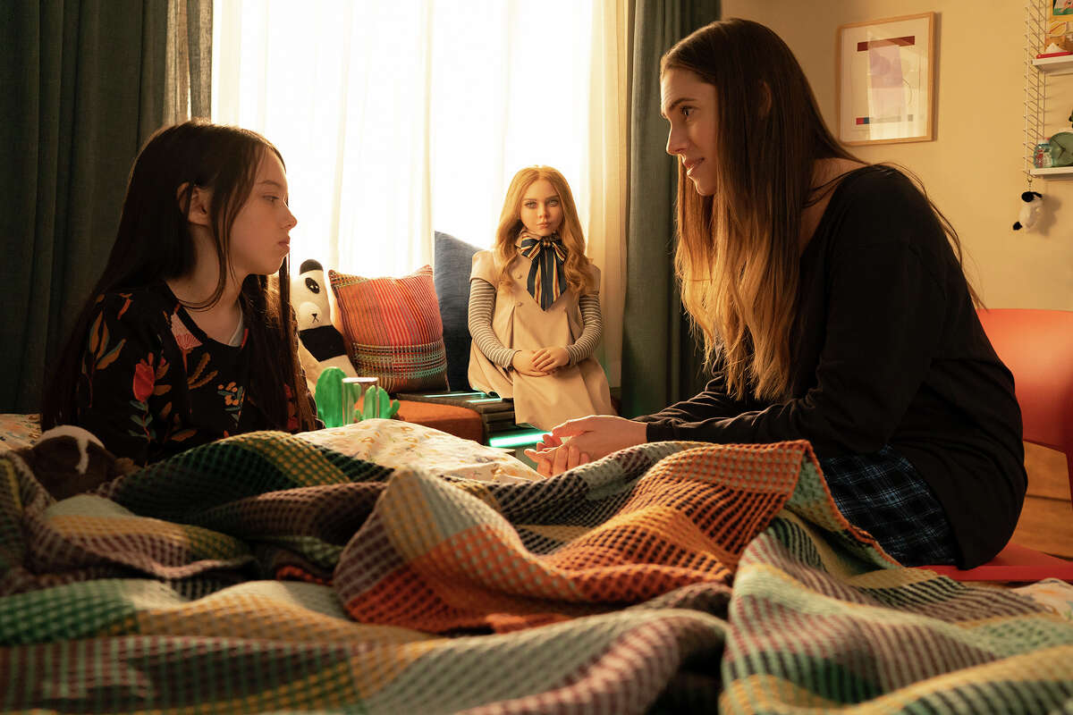 Cady (Violet McGraw), M3GAN and Gemma (Allison Williams) in "M3GAN," directed by Gerard Johnstone.