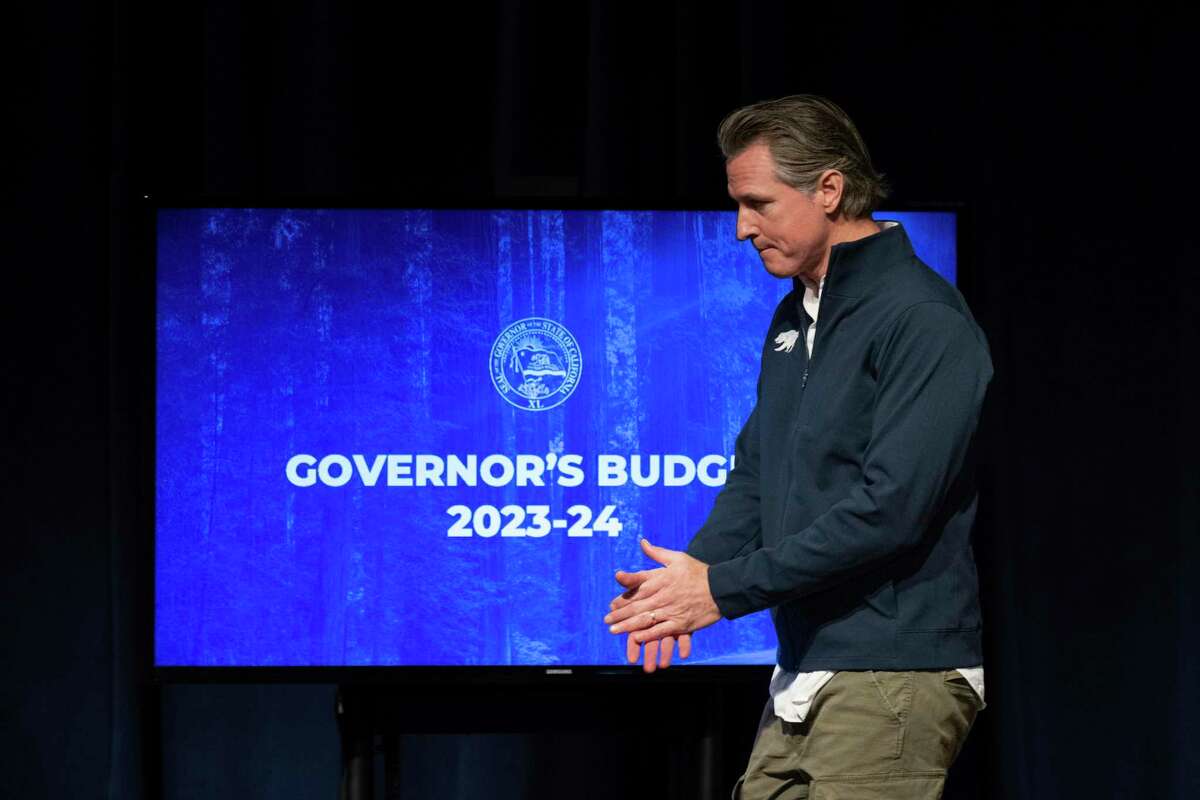 California Gov. Gavin Newsom leaves the stage after delivering his budget proposal in Sacramento, Calif., on Jan. 10, 2023.