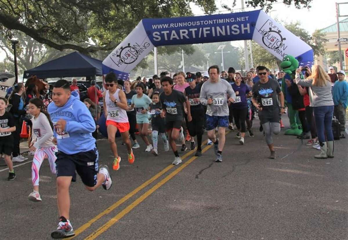 Participants take off in the 5K Turtle Race at National Oak Park in 2022, which was hosted by the Alvin ISD Education Foundation.
