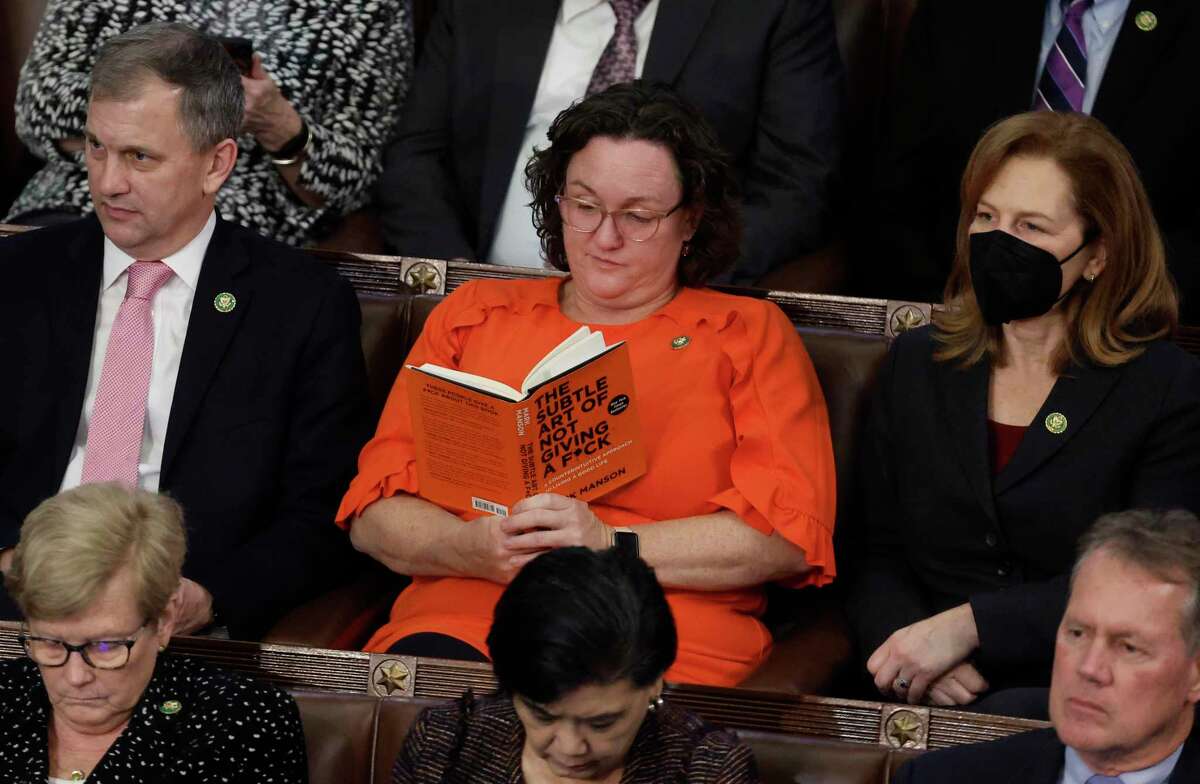 Rep. Katie Porter, D-Irvine, reads in the House chamber during the fourth day of elections for speaker. Porter on Tuesday announced her campaign for U.S. Senate.