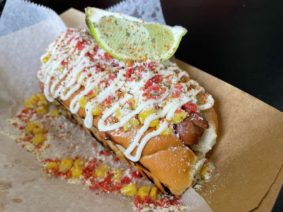 The Elote hot dog is topped with Mexican street corn at The Dogfather II.
