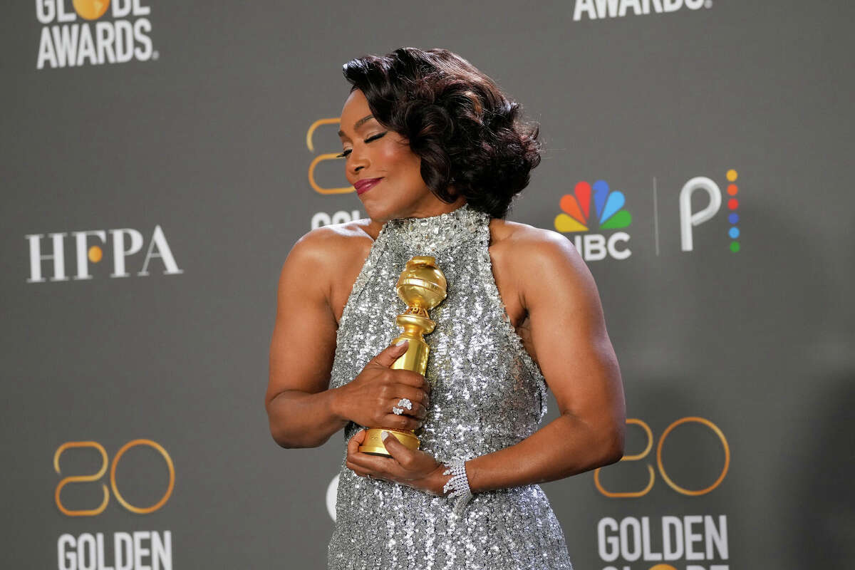 BEVERLY HILLS, CALIFORNIA - JANUARY 10: Angela Bassett poses with the Best Supporting Actress in a Motion Picture award for "Black Panther: Wakanda Forever" in the press room during the 80th Annual Golden Globe Awards at The Beverly Hilton on January 10, 2023 in Beverly Hills, California. (Photo by Kevin Mazur/Getty Images)