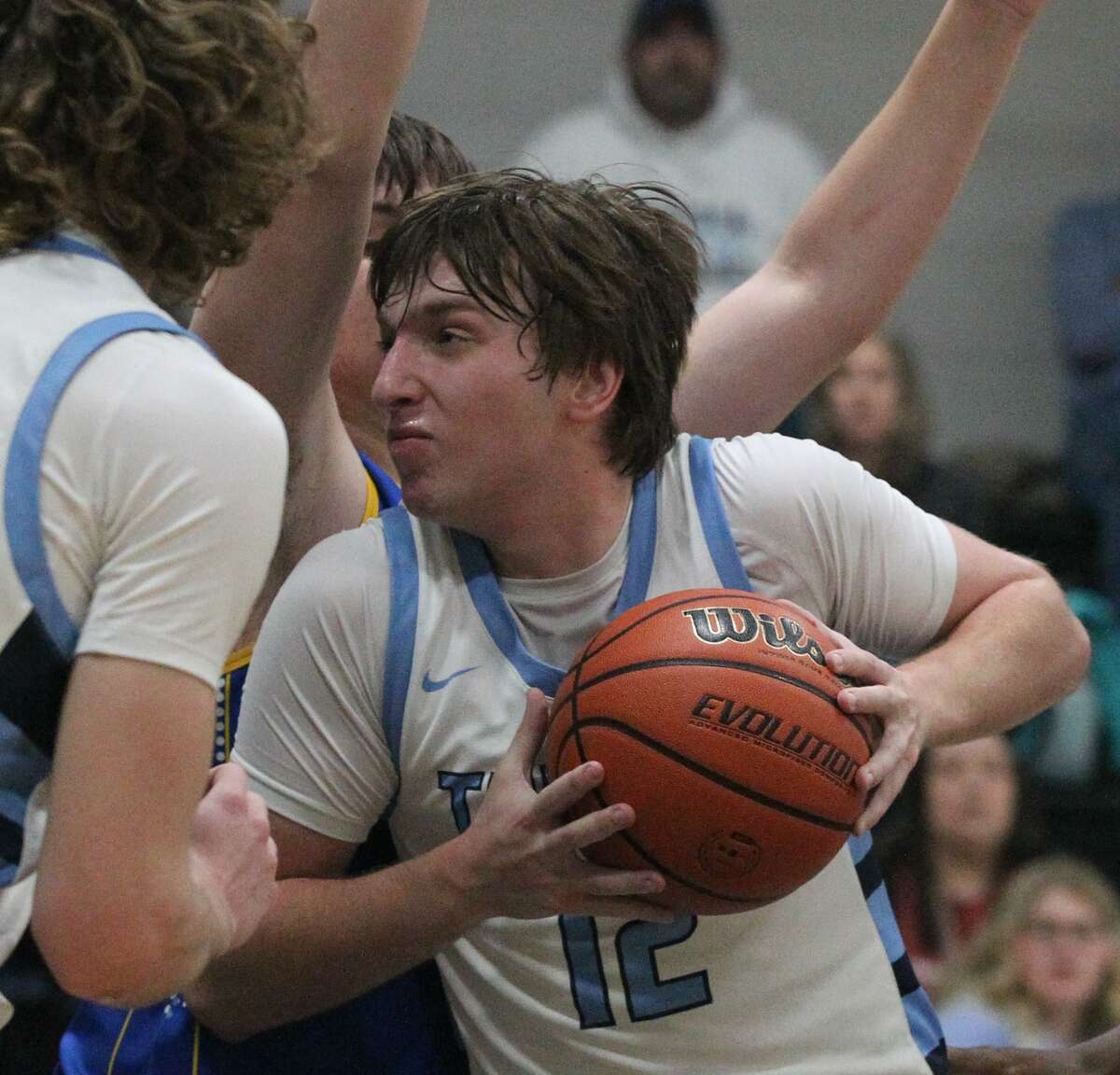 Triopia's Ryan Snow drives to the basket during the Triopia boys' basketball team's win over Pleasant Hill in the quarterfinals of the consolation bracket at the Winchester Invitational Tournament Tuesday night.