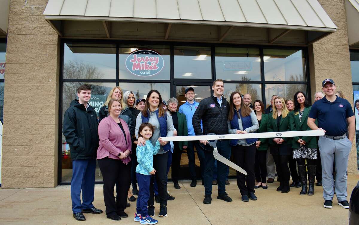 Members of the Mecosta County Area Chamber of Commerce marked the opening of a new Jersey Mike’s location in Big Rapids alongside new owners Mac and Mackenzie Gaznak who cut the ribbon together. 