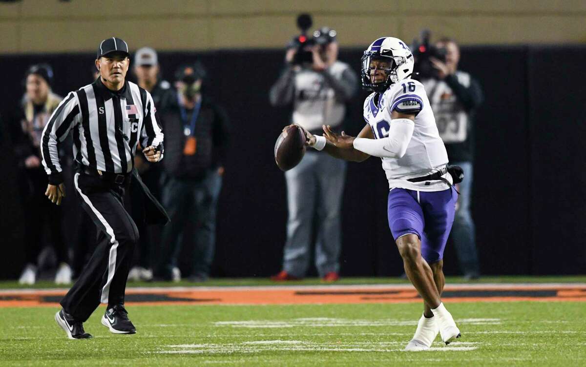 TCU quarterback Sam Jackson (16) prepares to throw a pass that went for 62 yards during the second half of the team's NCAA college football game against Oklahoma State Saturday, Nov. 13, 2021, in Stillwater, Okla. (AP Photo/Brody Schmidt)