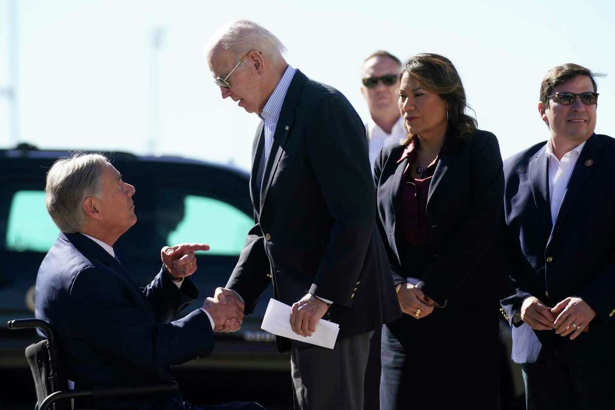 President Joe Biden and Gov. Greg Abbott shake hands in El Paso.