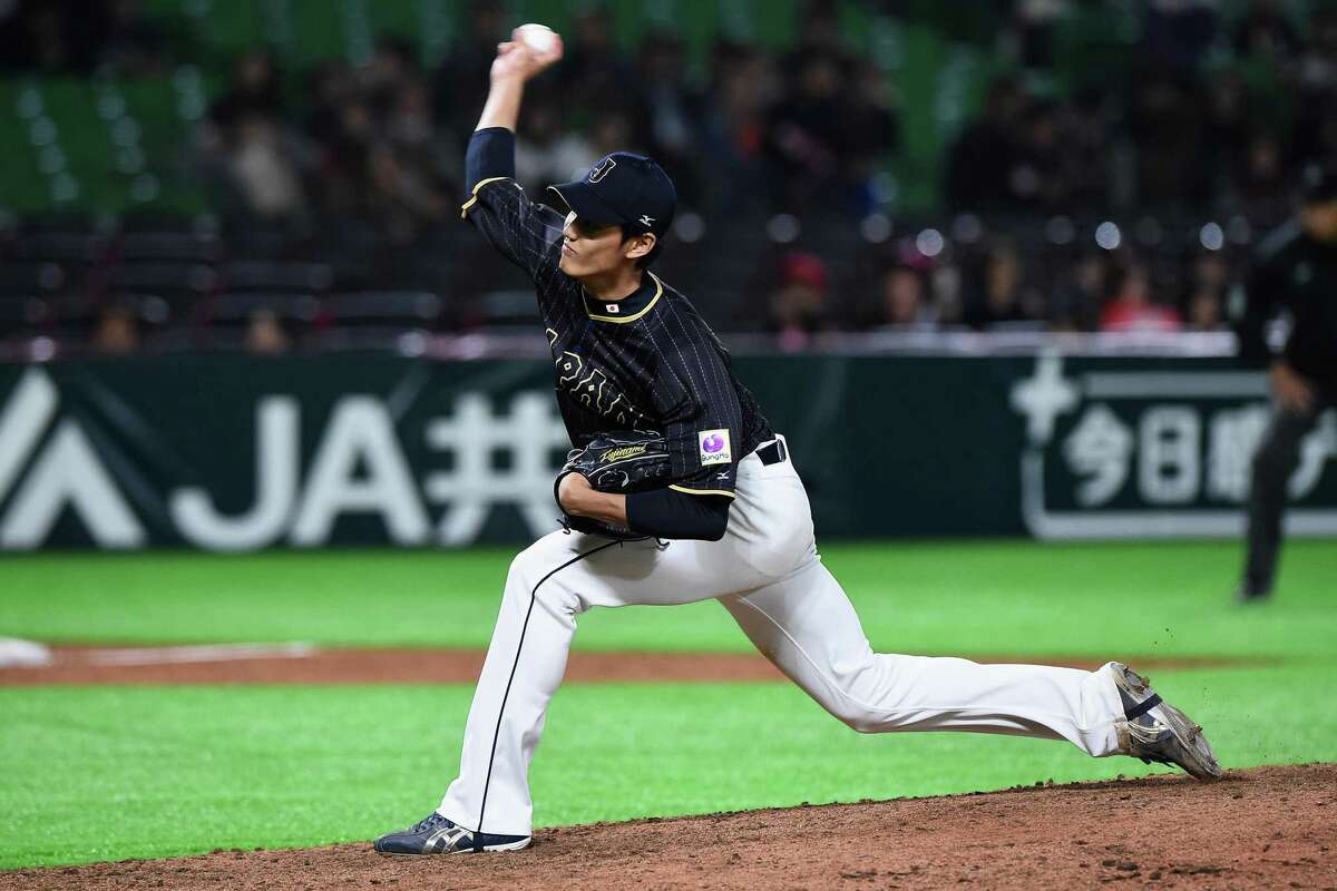 A's plan to keep Fujinami on throwing schedule he followed in Japan