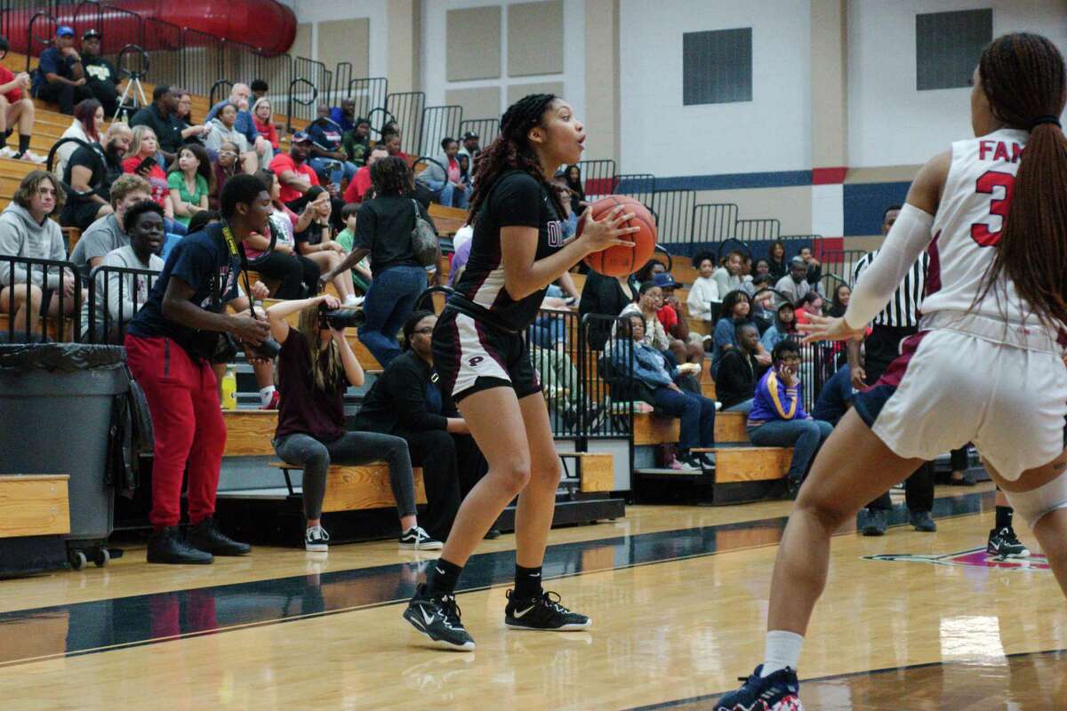 Pearland’s Nyah Hardy (with ball) is counted on to produce offense while helping a Lady Oiler defense which has allowed just 33.7 points per game in the playoffs.