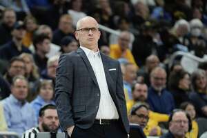 Dan Hurley, Kimani Young out for UConn game due to COVID-19