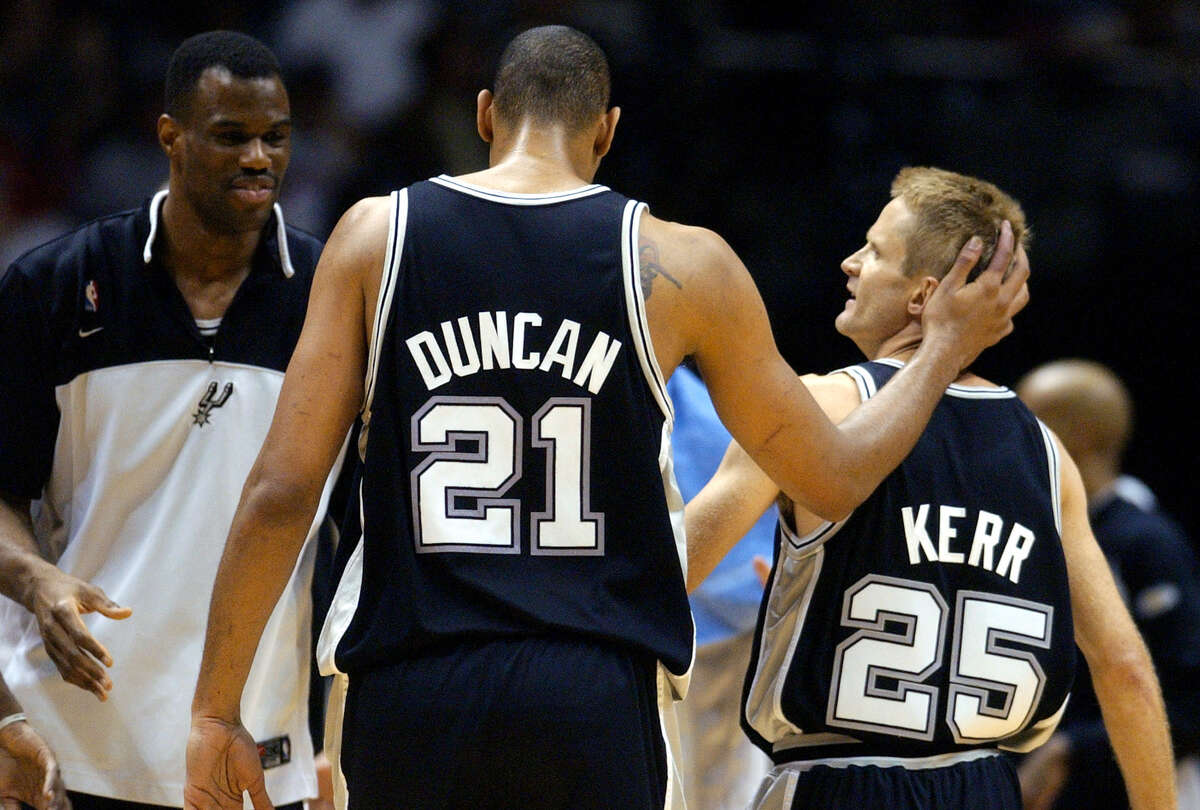 Happy Spurs Daviod Robinson, Tim Duncan and Steve Kerr during fourth quarter action in game five of the NBA Finals at Continental Airlines Arena in New Jersey on Friday, June 13, 2003 ( JERRY LARA STAFF )
