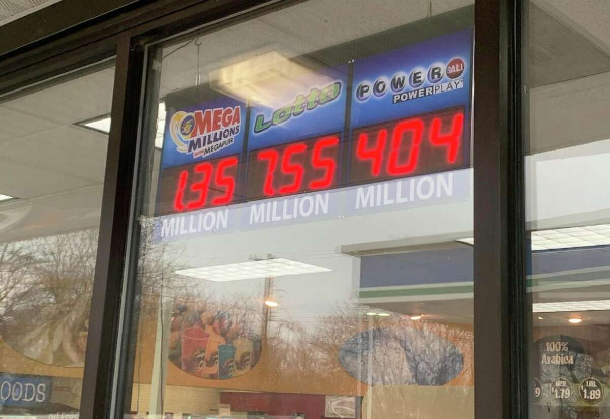 A sign at the Motomart in Edwardsville tells of Friday night's potential $1.35 billion Mega Millions drawing. If claimed by a single winner, the prize would be the second largest Mega Millions jackpot ever.