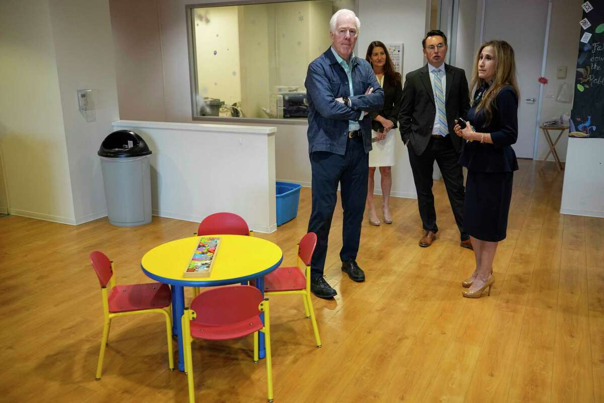 Sen. John Cornyn, R-Texas, tours The Children’s Assessment Center with Lisa Bourgoyne, right, following a round table meeting discussing the Respect for Child Survivors Act on Thursday, Jan. 12, 2023 in Houston. Cornyn joined Houston child abuse prevention advocates, law enforcement discussing Sen. Cornyn’s legislation to improve the treatment of FBI child victim witnesses by requiring trauma-informed experts to be part of any interview with a victim who reports child abuse or trafficking to the the FBI.