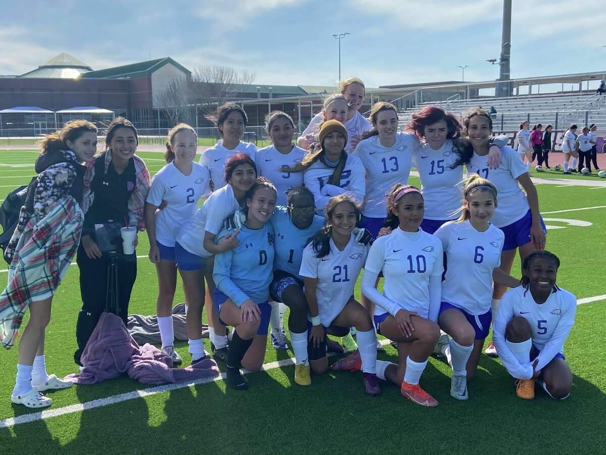 Oak Ridge's girls soccer team poses for a team picture after its 7-0 win over Cy Park at the I-10 Shootout on Thursday afternoon at Morton Ranch High School in Katy.