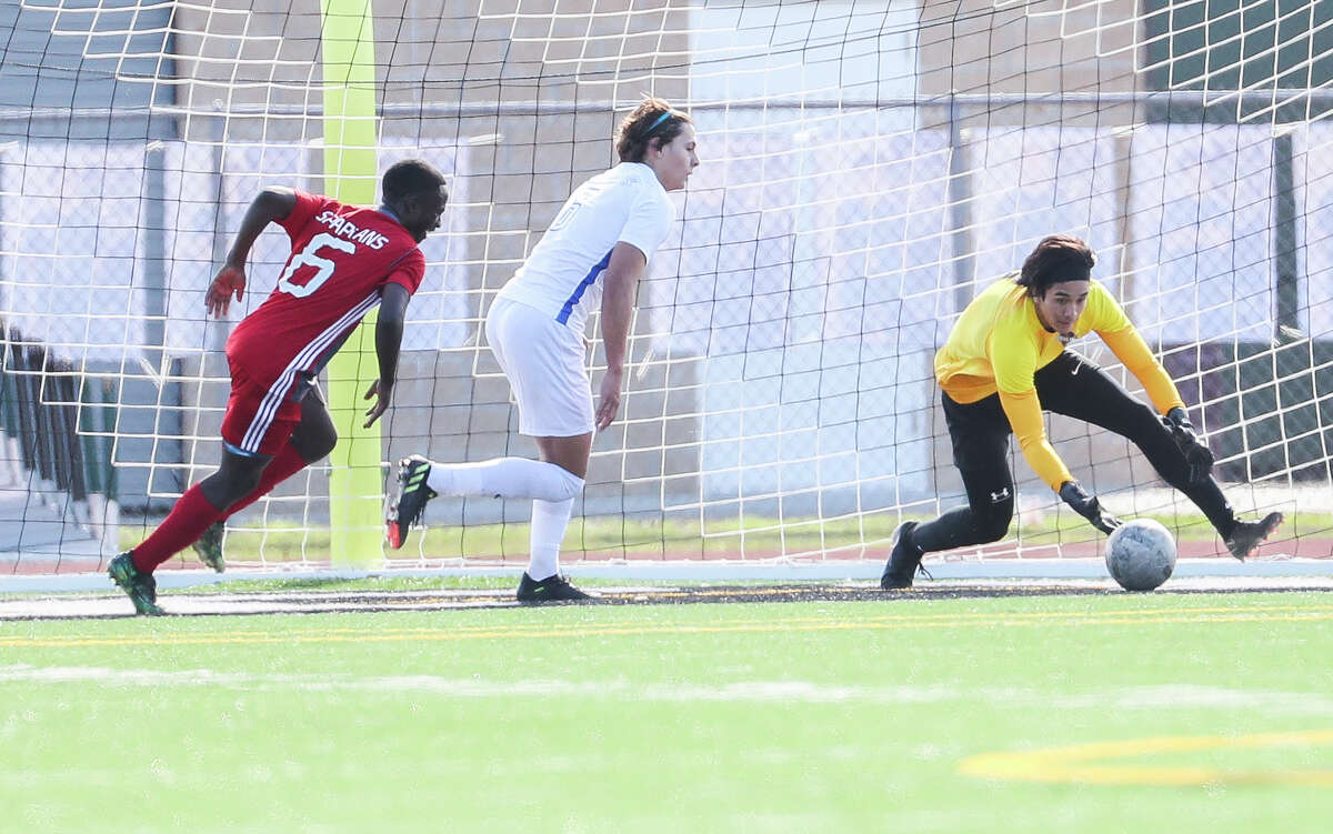 Grand Oaks goalie Rey Adams (1) collects the ball in a high school soccer match during the Humble ISD Classic at Kingwood Park High School, Thursday, Jan. 11, 2023, in Kingwood.