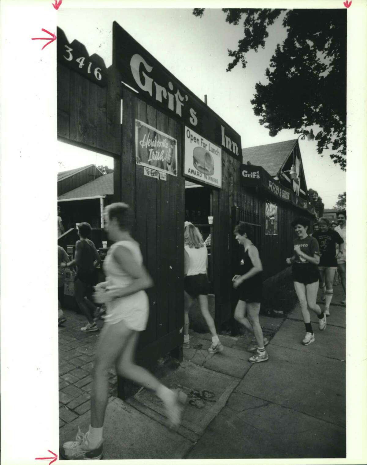 Runners Ramble Club members arrive at Grif's Inn after their run. Houston.