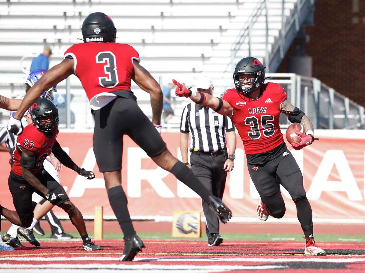 UIW Chance Trentman-Rosas (35) celebrates his touchdown after a blocked punt by Micahh Smith (3) against Houston Christian on Saturday, Nov. 5, 2022 at Benson Stadium. UIW defeated Houston Christian 73-20.