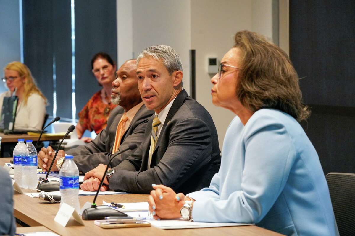 Mayor Ron Nirenberg, flanked by CPS Energy Board Chair Willis Mackey and San Antonio Water System Board Chair Jelynne Lablanc Jamison, speaks during a joint meeting of CPS’ and SAWS’ boards in September 2022 at CPS headquarters. Nirenberg recently expressed support for a plan recommended by CPS staff to close the utility’s coal operation in the next half decade and generate more of its electricity from natural gas-fired power plants and solar farms.