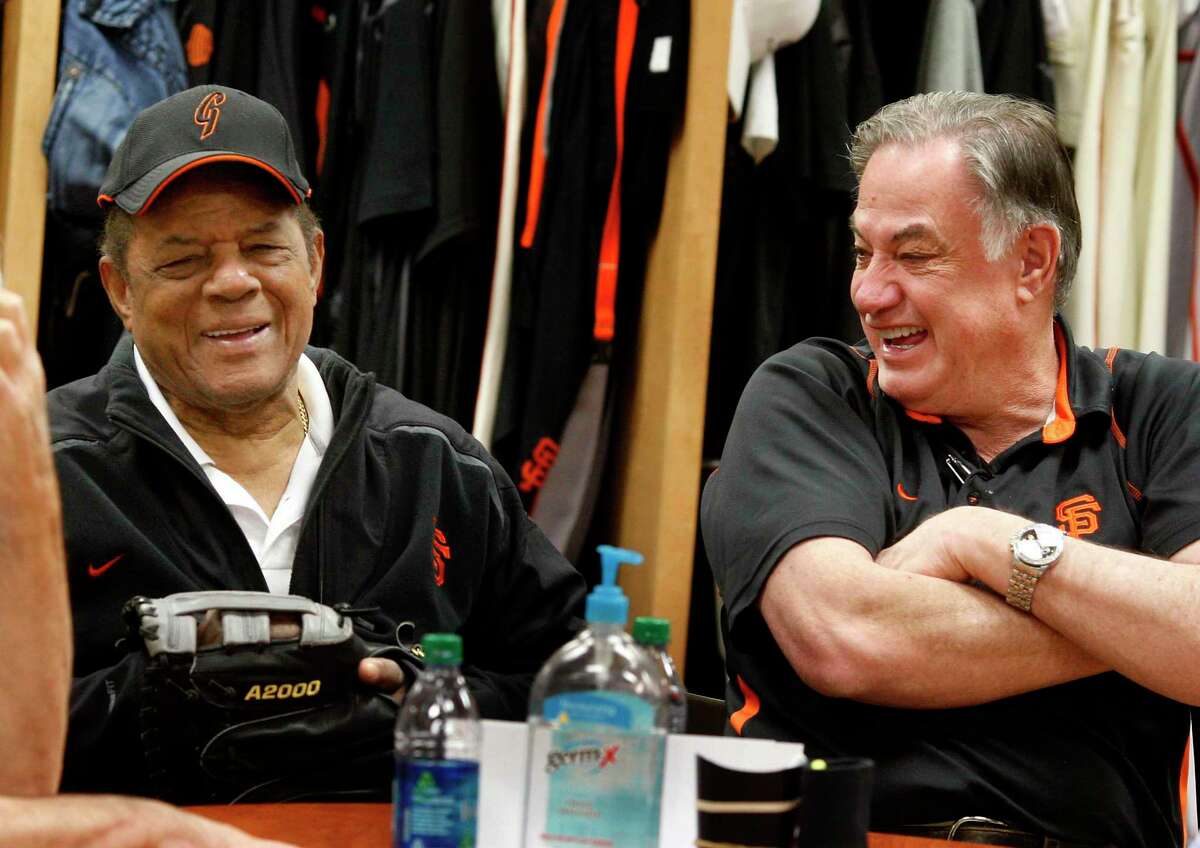 Willie Mays (left) and Giants equipment manager Mike Murphy enjoy a light moment when talking about their past together. The San Francisco Giants held a workout at their Scottsdale Stadium facility Wednesday February 24, 2011 and also a short inter squad game.