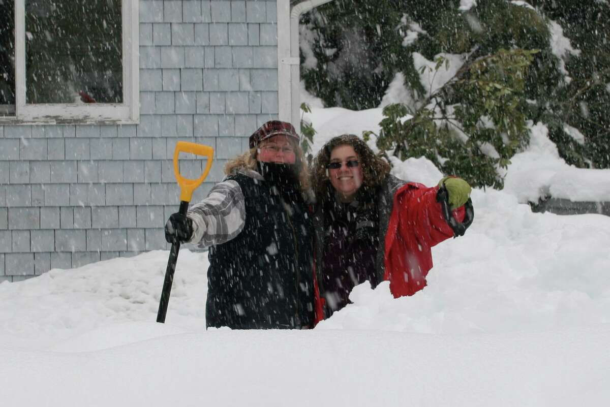 Kevin Fisher-Paulson’s friends Amanda and Ann frolic in the snow near their home in the Catskill Mountains.