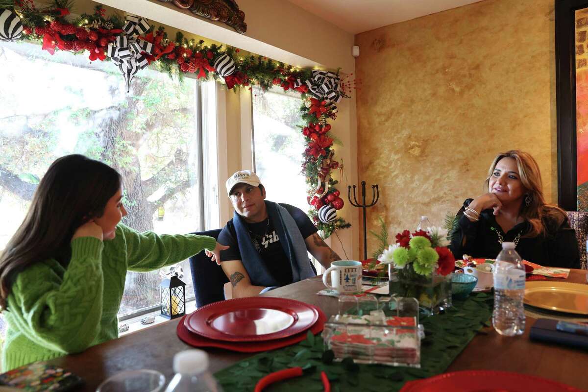Former Texas State Rep. Poncho Nevárez at his home for lunch with his wife, Rossy, right, and daughter, Renata, in Eagle Pass, Texas, Tuesday, Dec. 20, 2022. Nevárez hit a staggering new low when in 2019 he accidentally dropped an envelope full of cocaine baggies while at the Austin airport, the undeniable physical proof of an addiction problem that had been festering for months. Three years later, he's managed to take back control of his life. He's clean, he's back to practicing law, and he's even embarked on a music career that's been a healthy outlet for expressing his feelings about his journey to recovery.