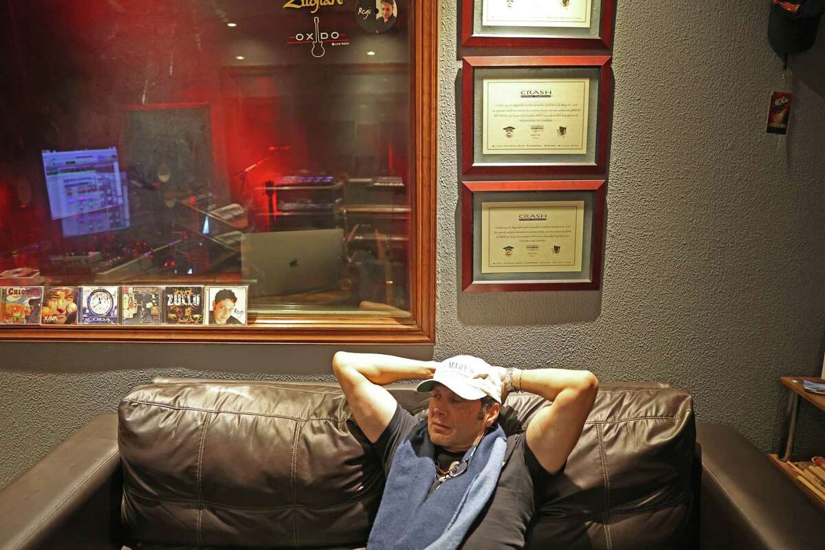 Former Texas State Rep. Poncho Nevárez listens to his songs at AudioRec Productions, a recording studio in Piedras Negras, Mexico, Tuesday, Dec. 20, 2022. Nevárez hit a staggering new low when in 2019 he accidentally dropped an envelope full of cocaine baggies while at the Austin airport, the undeniable physical proof of an addiction problem that had been festering for months. Three years later, he's managed to take back control of his life. He's clean, he's back to practicing law, and he's even embarked on a music career that's been a healthy outlet for expressing his feelings about his journey to recovery. He is recording the songs with studio owner and fellow musician, Reginaldo Sanchez Gonzalez,