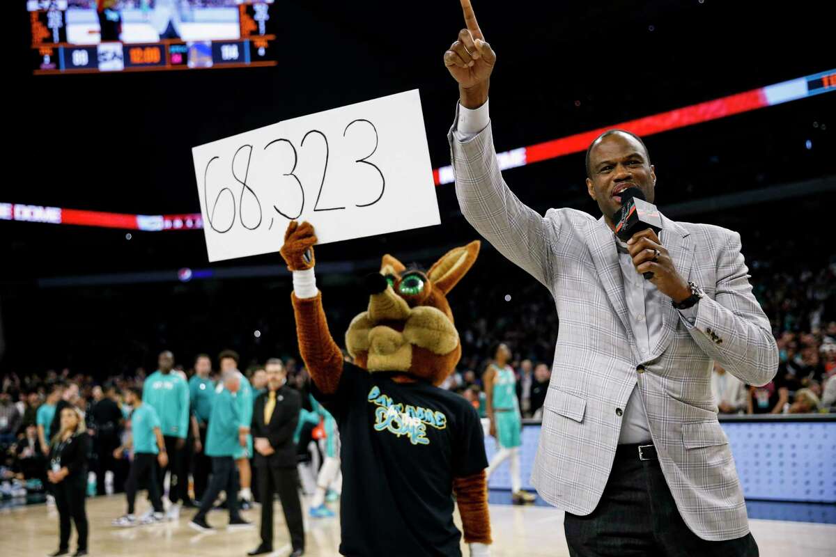 Former Spurs player David Robinson and Coyote announce that the crowd broke the single game attendance record during the San Antonio Spurs vs. Golden State Warriors game at the Alamodome in San Antonio, Texas, Friday, Jan. 13, 2023.