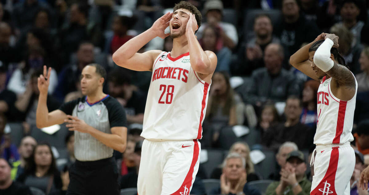 Houston Rockets center Alperen Sengun (28) reacts after being whistled or a blocking foul during the first half of the team's NBA basketball game against the Sacramento Kings in Sacramento, Calif., Friday, Jan. 13, 2023. (AP Photo/Jose Luis Villegas)