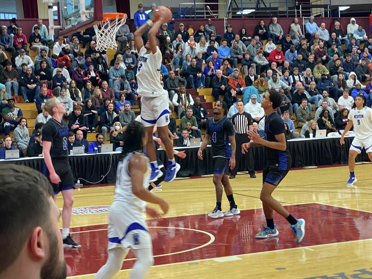 UConn commit Stephon Castle slams home a dunk at the Hoophall Classic on Saturday.