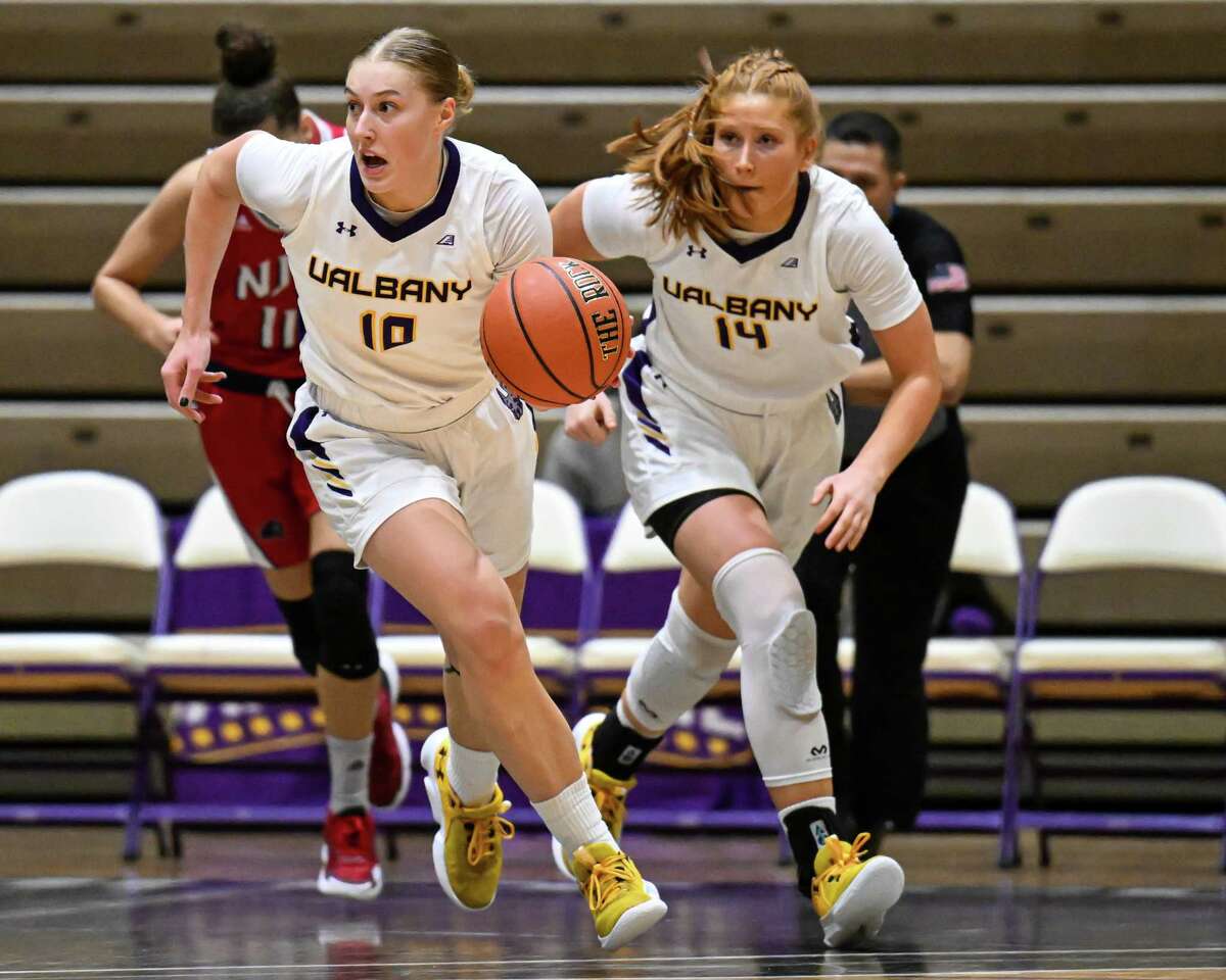 UAlbany graduate student Ellen Hahne, left, and senior Grace Heeps, run the fast break during a game against the New Jersey Institute of Technology on Saturday, Jan. 14, 2023. Heeps said the Great Danes need to tighten up to continue their dominance in the America East.