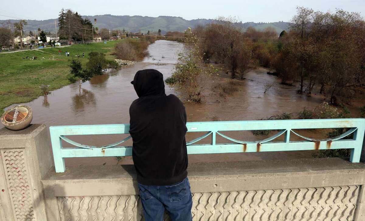 The Pajaro River in Watsonville swells on Thursday. Even after one of the worst droughts in California history, the state wasn’t ready to capture and use the deluge of rain it just received. 