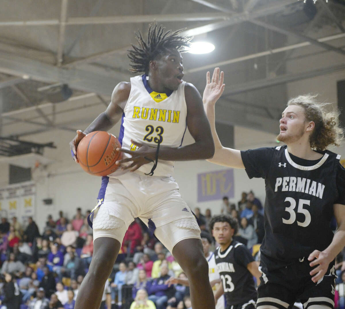 HS BOYS BASKETBALL: MHS’ Robinson, Rickett Named To 2-6A First Team