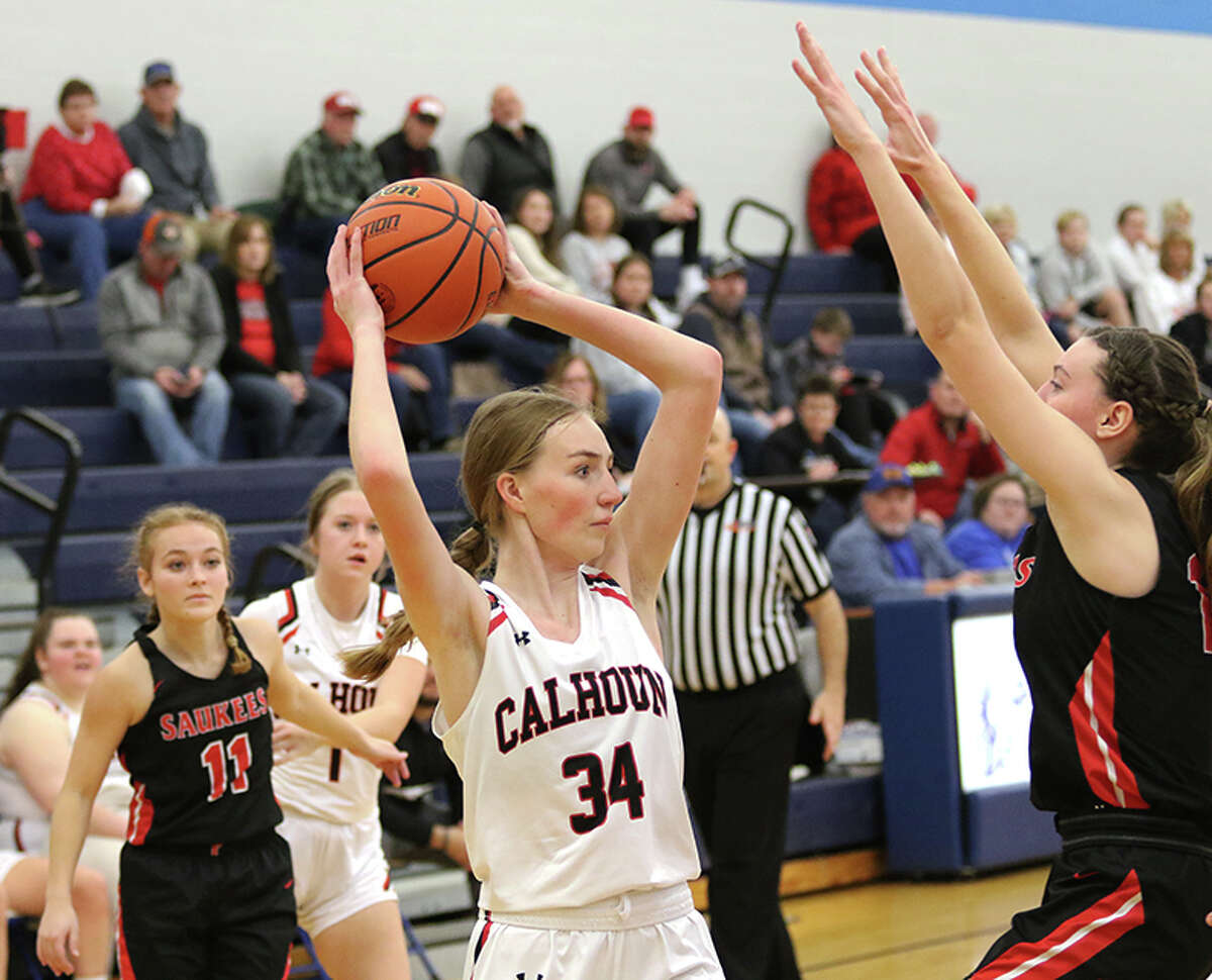 Calhoun's Kate Zipprich (34) looks for a teammate against Pittsfield in the title game of North Greene's Lady Spartan Classic Saturday afternoon at White Hall.