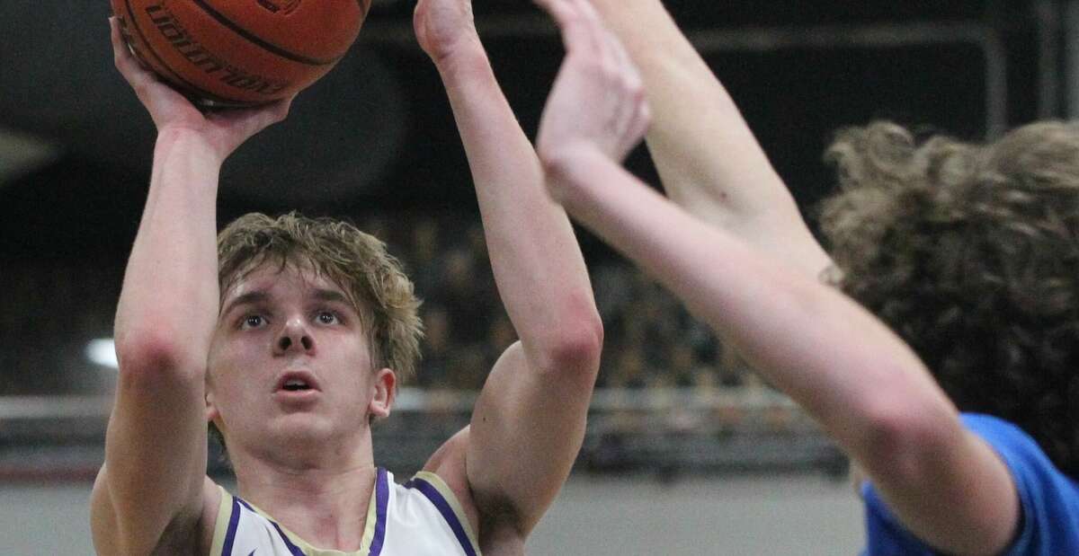 Action from the Routt boys' basketball team's win over PORTA/A-C Central in the championship game of the 100th Winchester Invitational Saturday night in Winchester