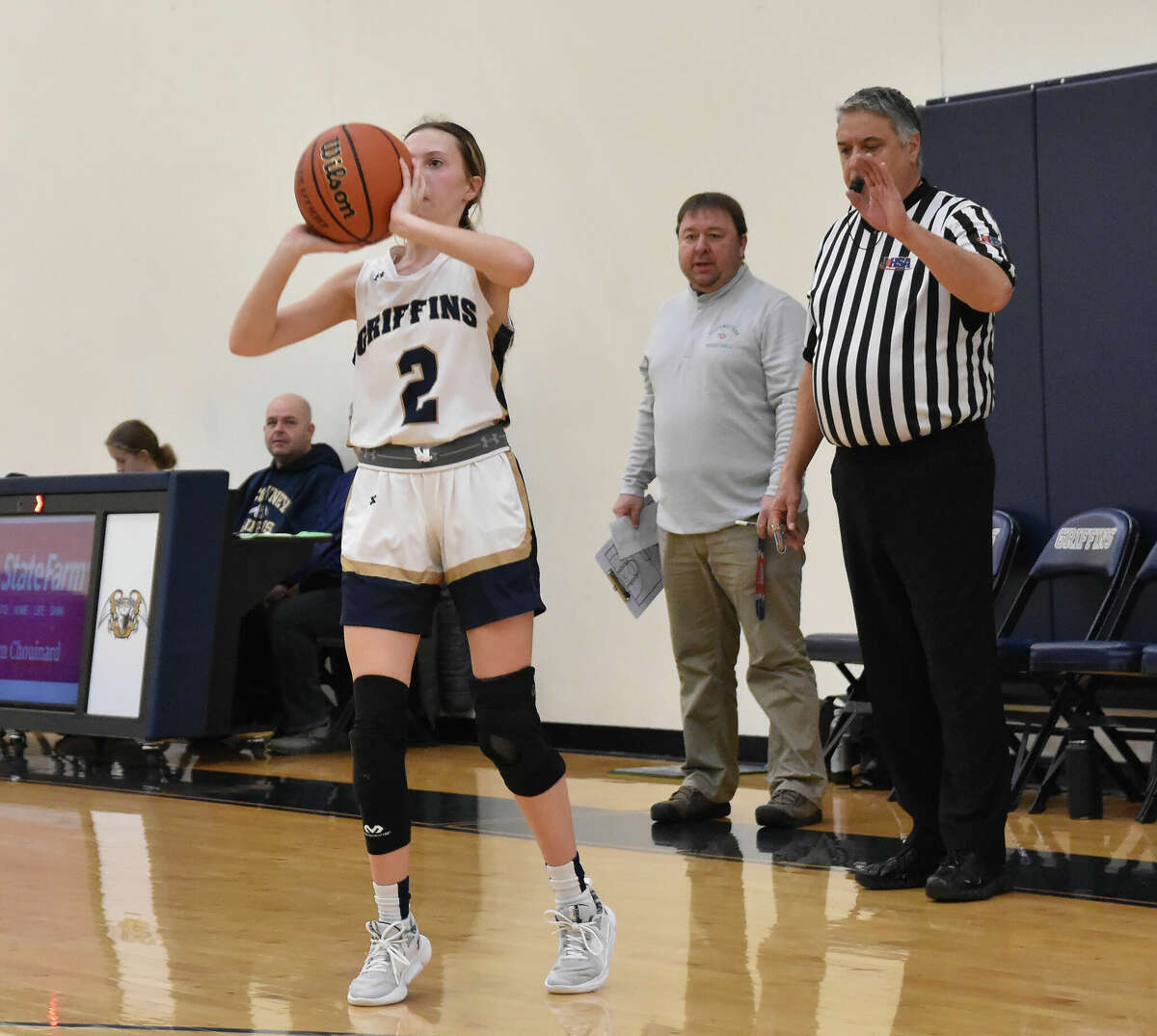 Father McGivney's Claire Stanhaus puts up a 3-pointer against Southwestern on Saturday in Glen Carbon.