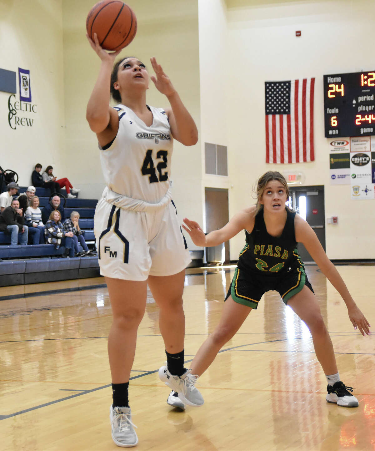 Father McGivney's Emily Johnson with a layup against Southwestern on Saturday in Glen Carbon.