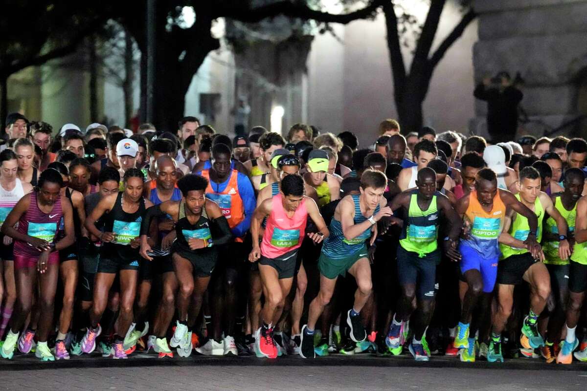 Runners take off from the starting line for the 51st Chevron Houston Marathon on Sunday, Jan. 15, 2023 in Houston.