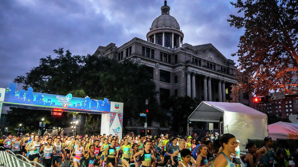 Runners take off from the starting line for the 51st Chevron Houston Marathon on Sunday, Jan. 15, 2023 in Houston.