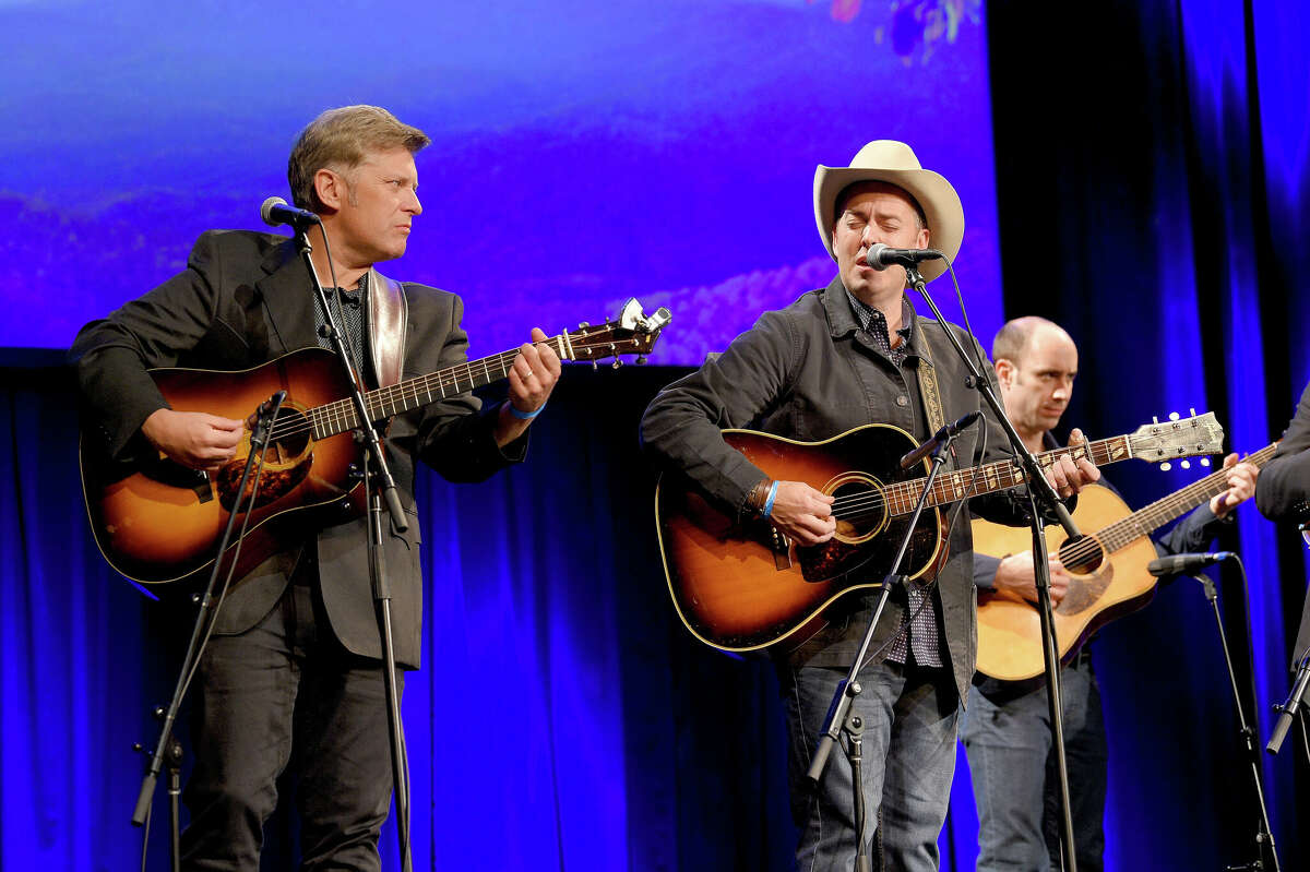 Eric Gibson, left, and Leigh Gibson of The Gibson Brothers performs onstage at Country Music Hall of Fame and Museum in 2018 in Nashville, Tennessee. 