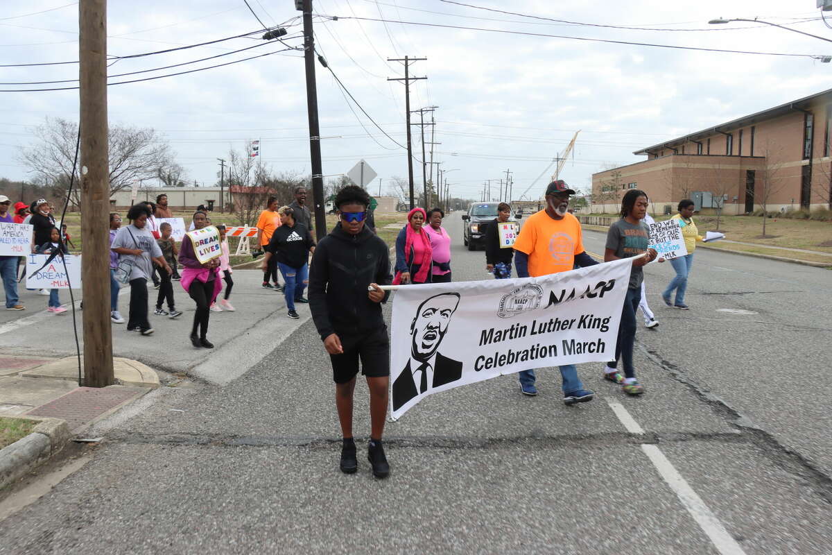 MLK Day march attendees make a right turn onto Green Avenue on Monday, Jan. 16, 2023. The annual march started at Mount Sinai Baptist Church and ended at the Riverfront Boardwalk and Pavilion.