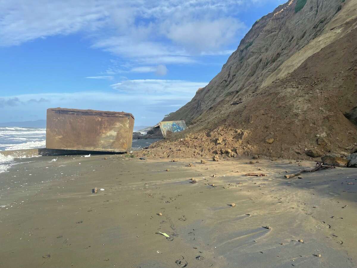 A World War II structure tumbled an estimated 200 feet down a cliffside onto Fort Funston Beach in San Francisco, the San Francisco Fire Department confirmed.