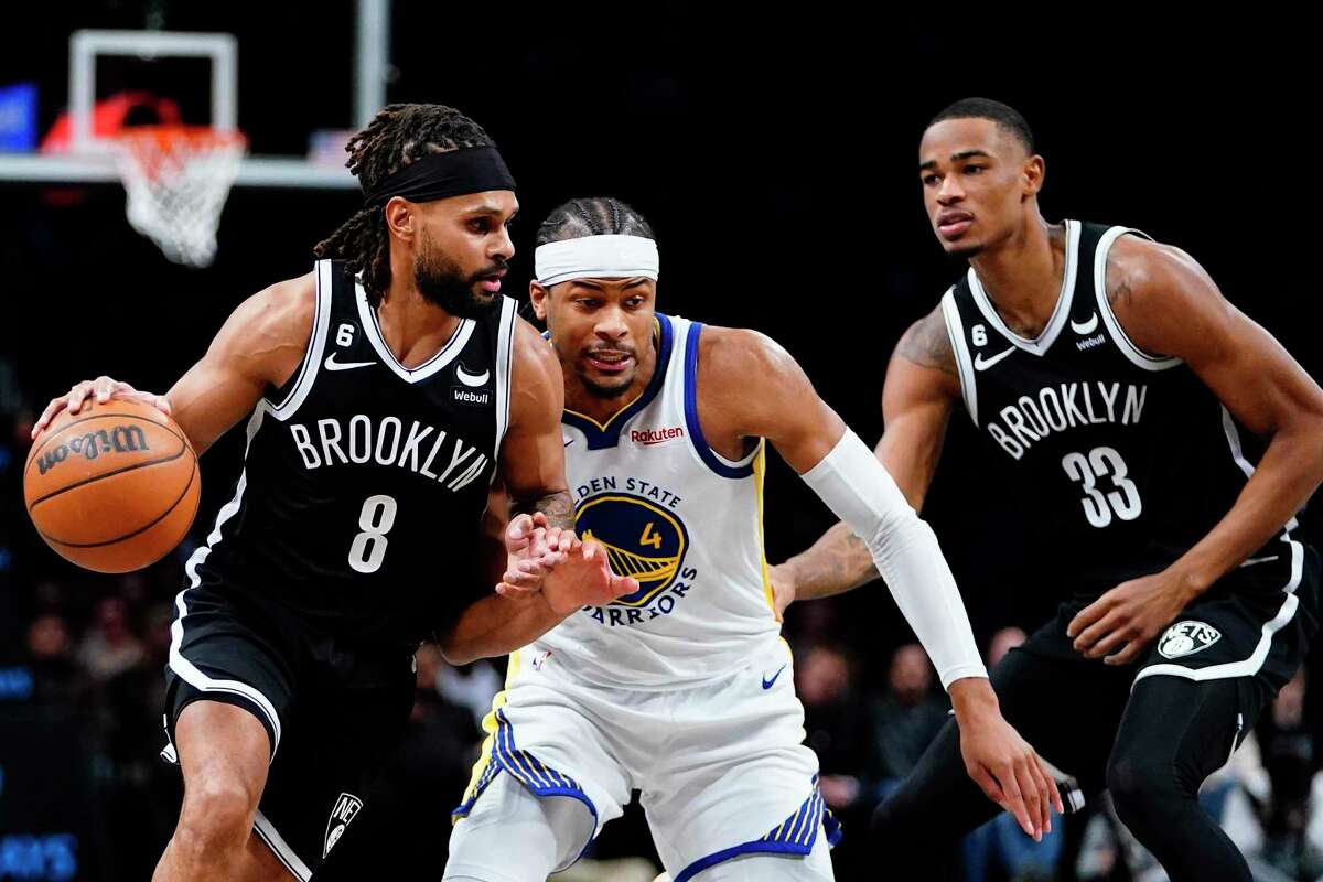The Nets' Patty Mills (8) isn’t getting as much playing time this season, but he remains a positive influence in the locker room.