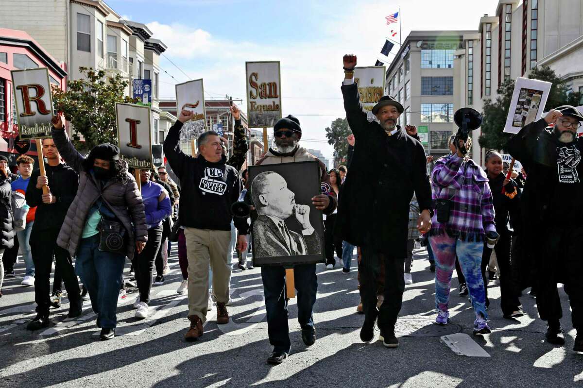 A San Francisco crowd commemorates the Rev. Martin Luther King Jr.’s historic march from Selma to Montgomery, Ala.