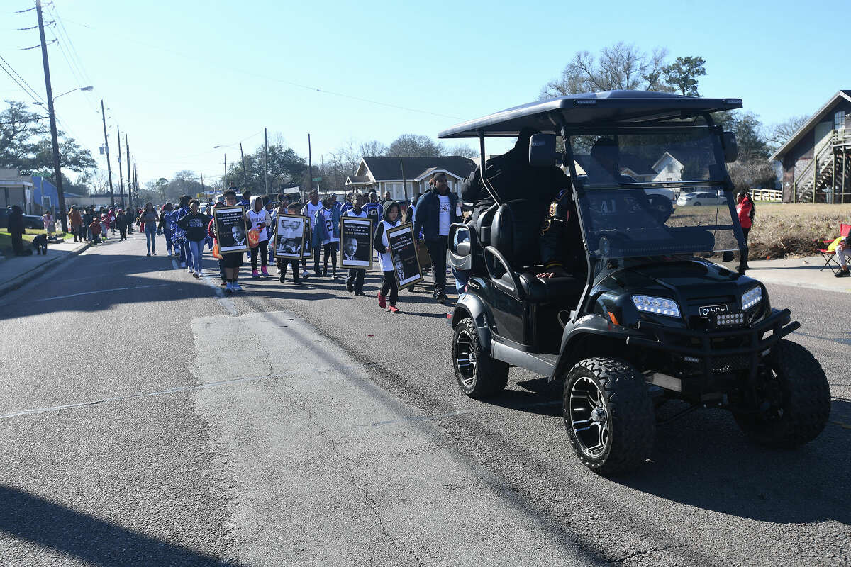 A crowd lines the route as the Martin Luther King, Jr., parade makes its way up Highland Avenue Saturday. Photo made Saturday, January 14, 2023 Kim Brent/Beaumont Enterprise
