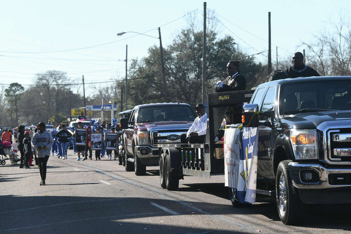 A crowd lines the route as the Martin Luther King, Jr., parade makes its way up Highland Avenue Saturday. Photo made Saturday, January 14, 2023 Kim Brent/Beaumont Enterprise